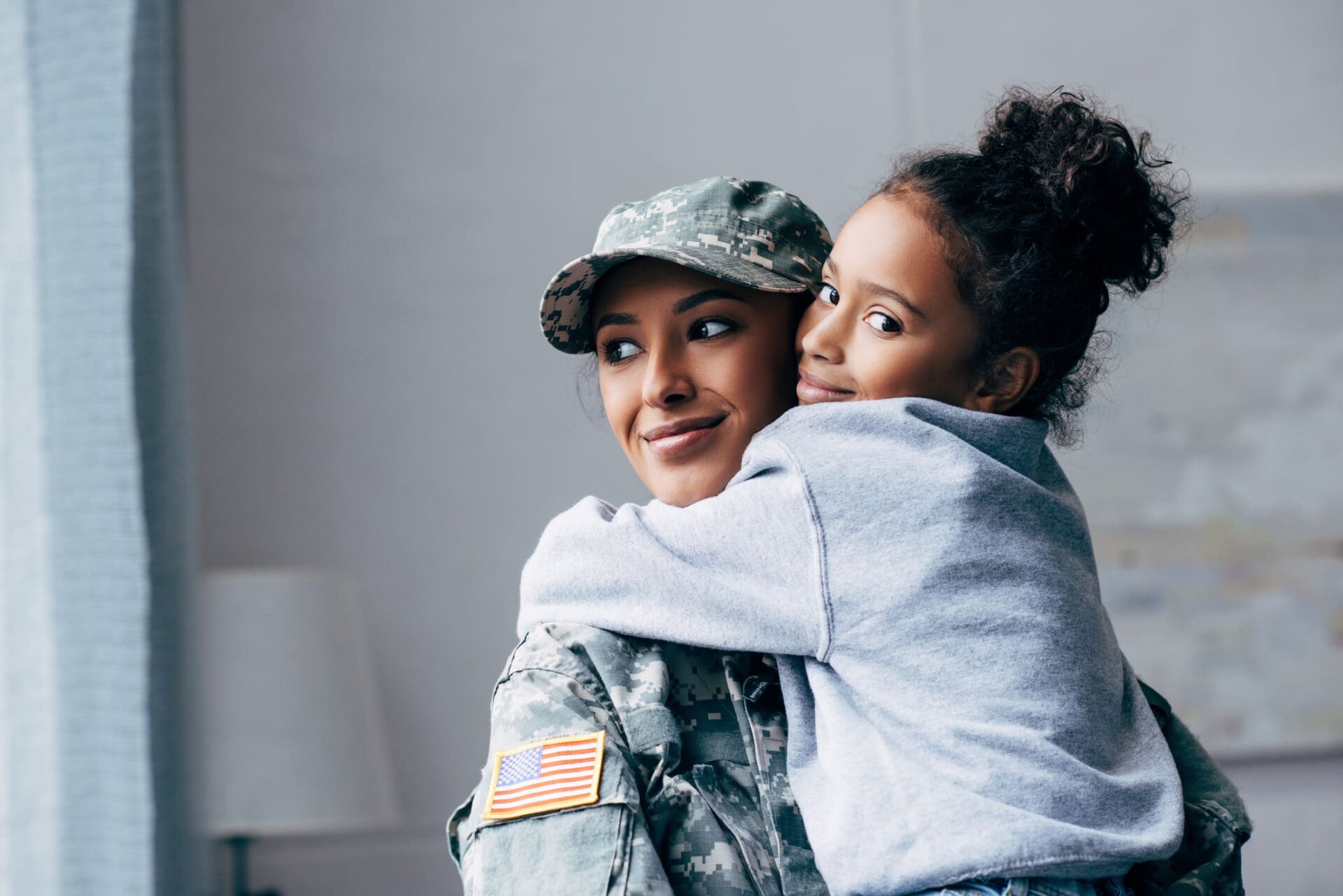 Mother and daughter hugging