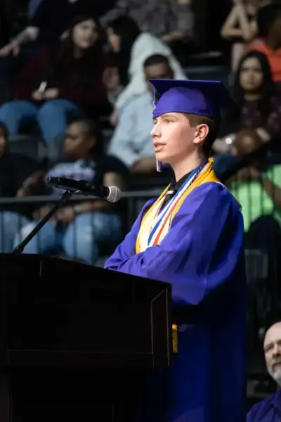 student speaking at graduation
